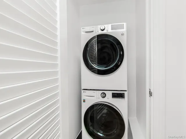 a kitchen with stainless steel appliances kitchen island a cabinets and wooden floor