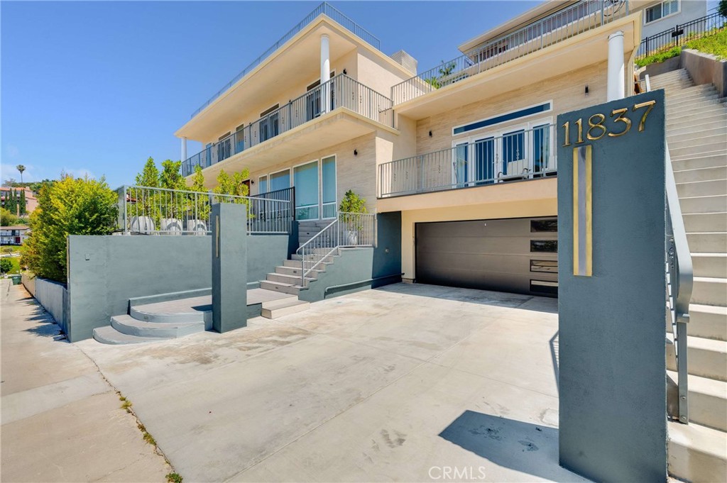11837 Rideout Way Whittier, CA 90601 - Photo 1 of 44 a view of a house with a garage