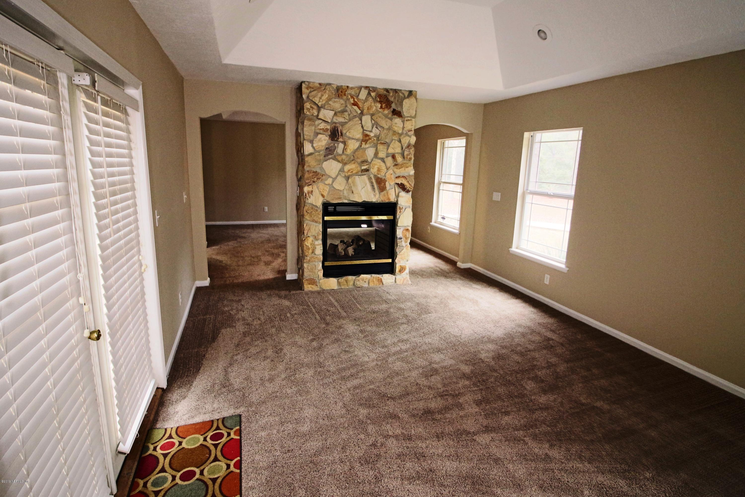 6055 Trawick Road Keystone Heights, FL 32656 - Photo 32 of 60 31) Two Sided Fireplace