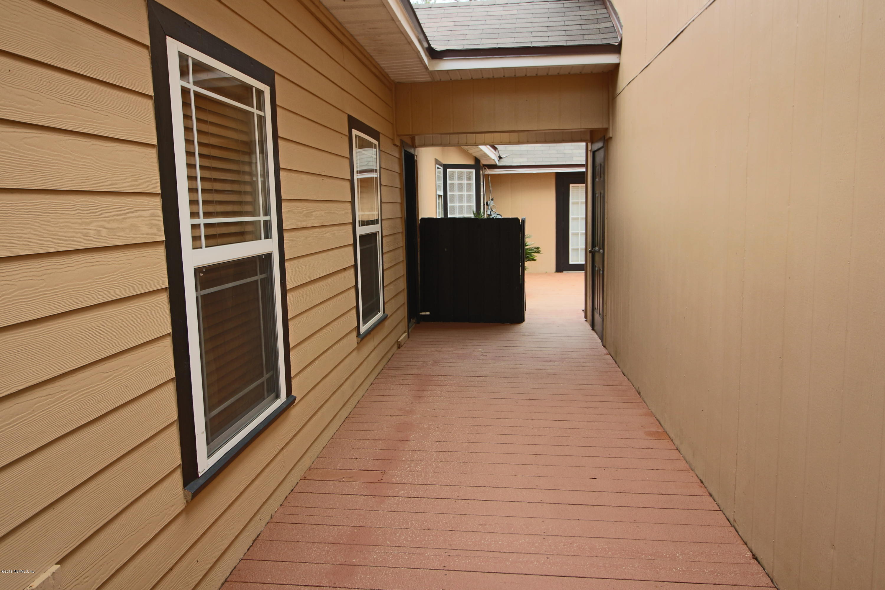 6055 Trawick Road Keystone Heights, FL 32656 - Photo 45 of 60 44) Breezeway to Garage