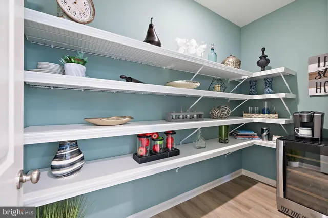 a room with two beds and a window