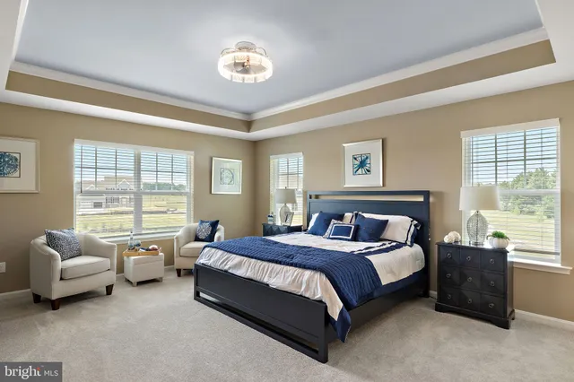 a bathroom with a sink double vanity granite and a mirror