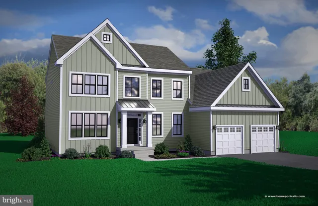 a front view of a house with a garden and porch