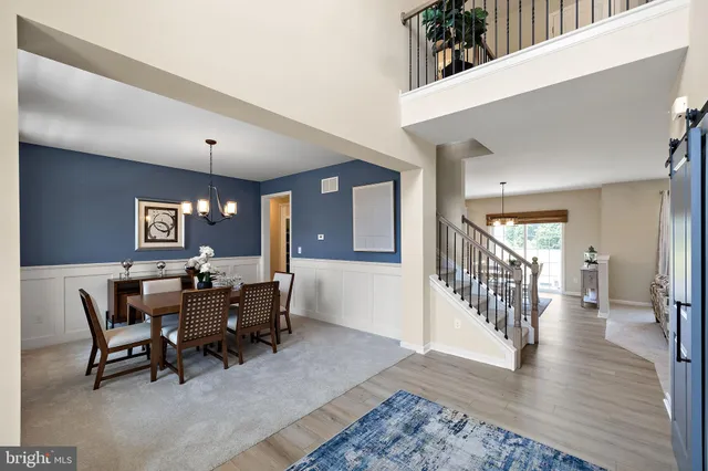 a view of a livingroom with furniture and window