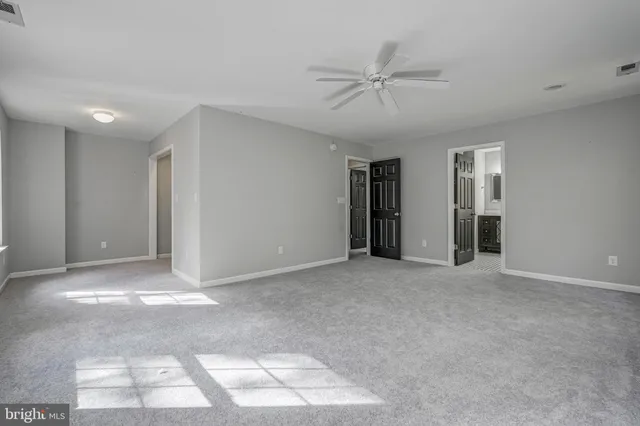 a view of an empty walk in closet