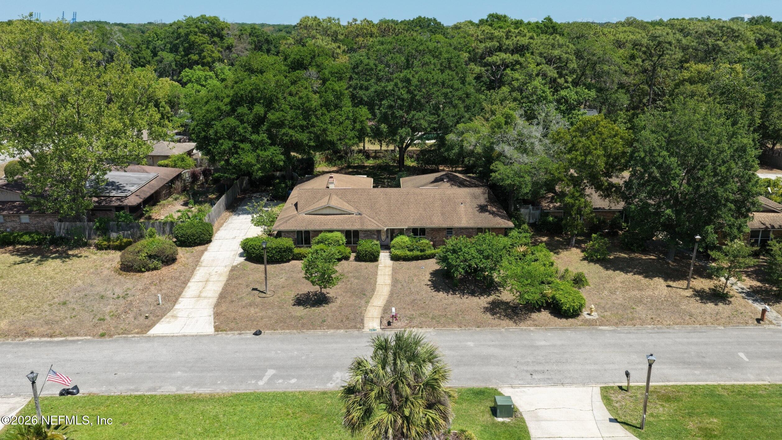 3371 Debussy Road Jacksonville, FL 32277 - Photo 5 of 21 DJI_20260423135851_0003_D