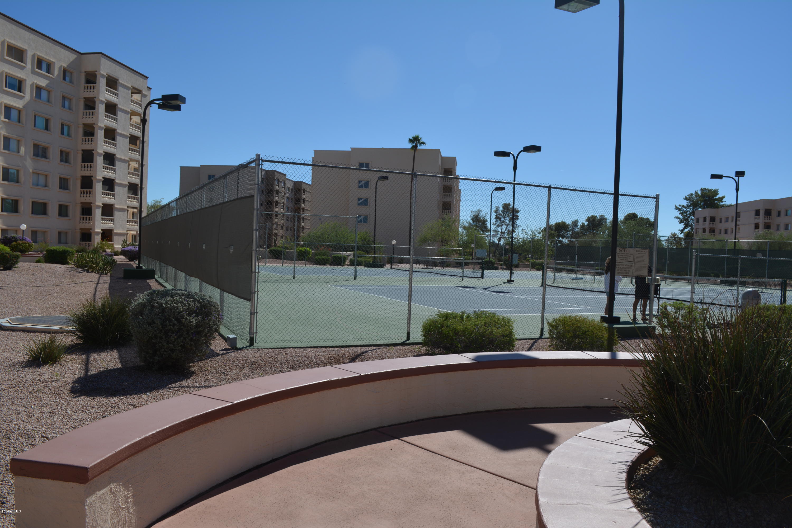 7870 East Camelback Road, Unit 412 Scottsdale, AZ 85251 - Photo 12 of 15 a view of a street with a building in the background