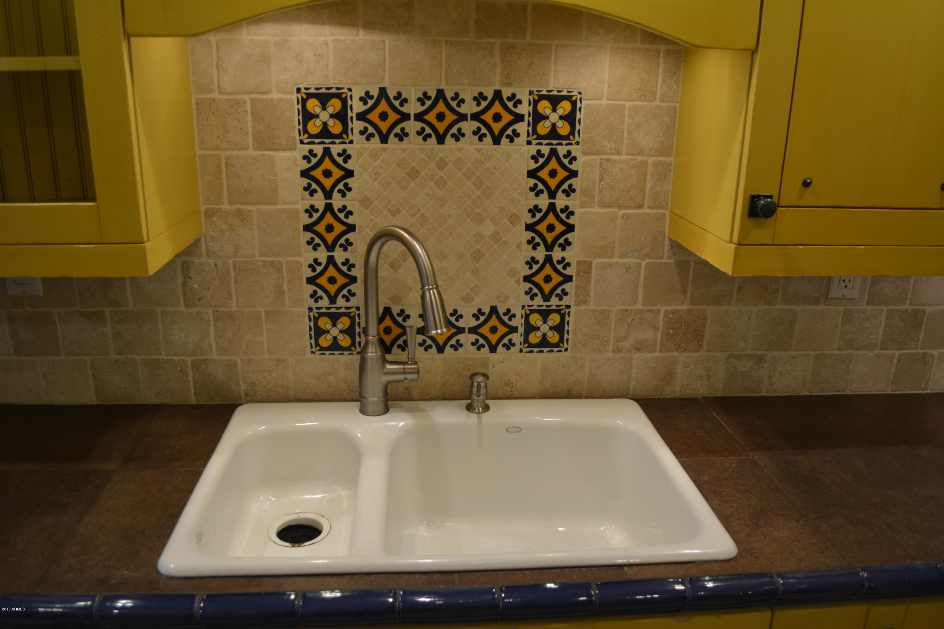 7870 East Camelback Road, Unit 412 Scottsdale, AZ 85251 - Photo 4 of 15 a bathroom with a sink