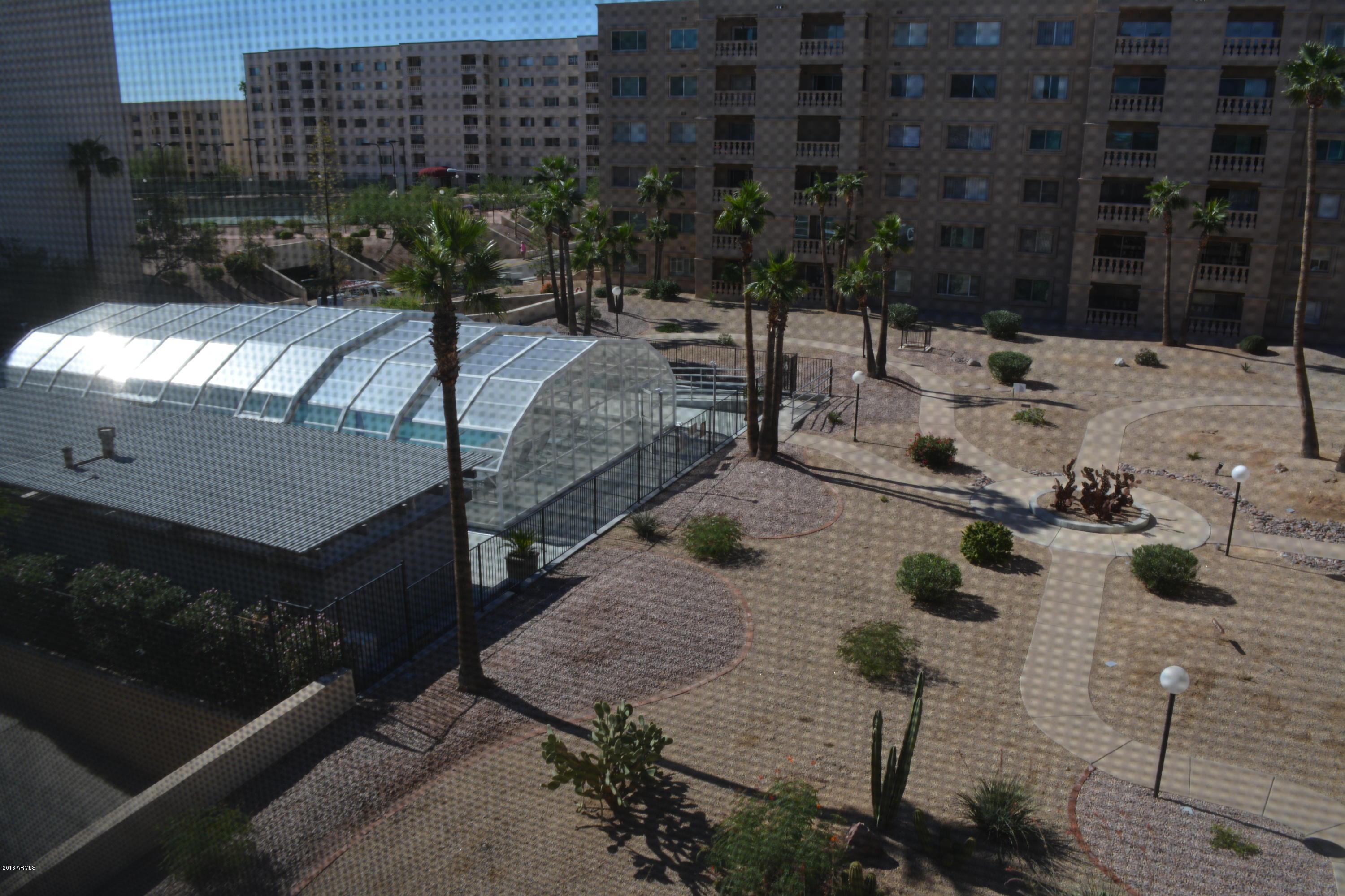 7870 East Camelback Road, Unit 412 Scottsdale, AZ 85251 - Photo 6 of 15 a view of yard from a patio