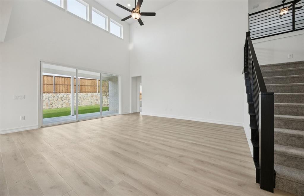 11169 Roxburgh Road Fort Worth, TX 76052 - Photo 8 of 22 *Floorplan representation, not actual home - Spacious gathering room with large windows
