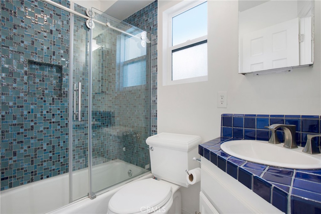 127 40th Street Manhattan Beach, CA 90266 - Photo 12 of 29 a bathroom with a sink toilet and shower