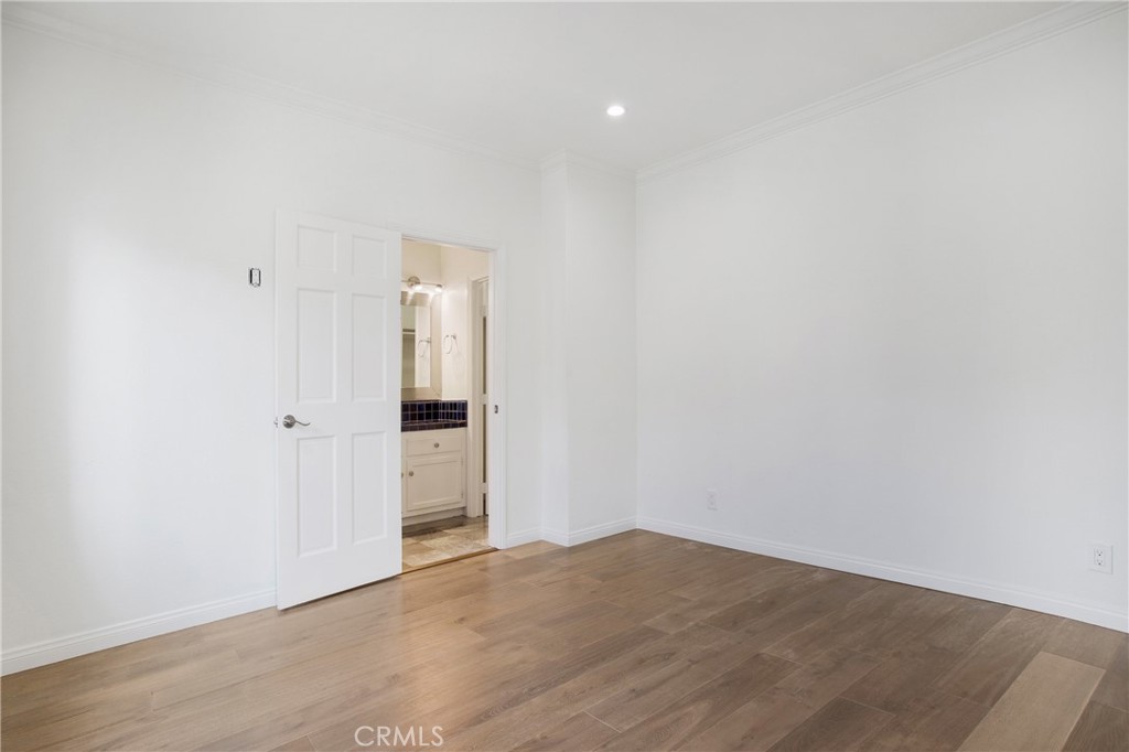 127 40th Street Manhattan Beach, CA 90266 - Photo 15 of 29 a view of empty room with wooden floor