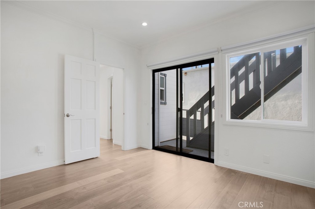 127 40th Street Manhattan Beach, CA 90266 - Photo 16 of 29 a view of an entryway with wooden floor