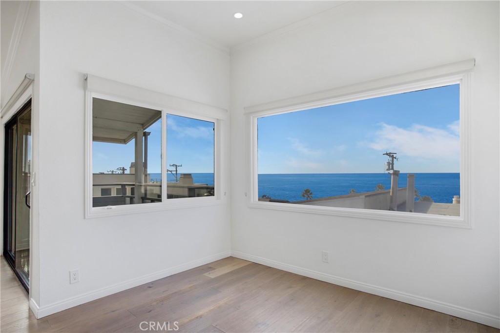 127 40th Street Manhattan Beach, CA 90266 - Photo 22 of 29 a view of a room that has a sink and wooden floor