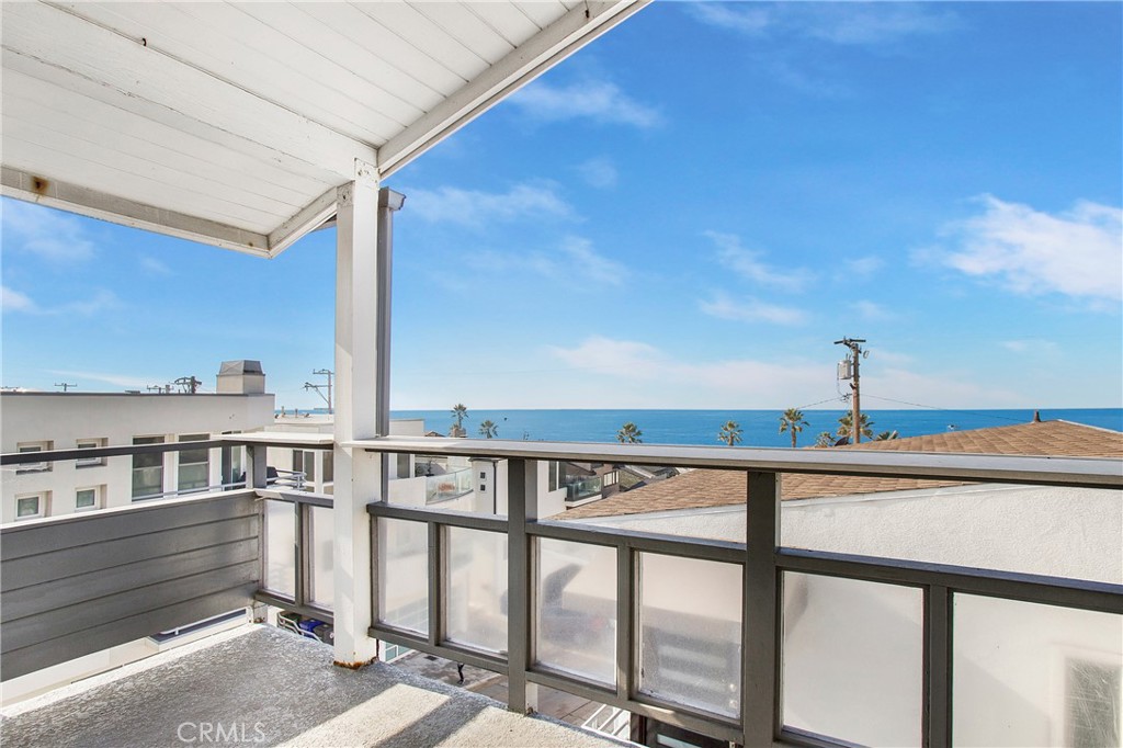127 40th Street Manhattan Beach, CA 90266 - Photo 3 of 29 a front view of a house with large windows