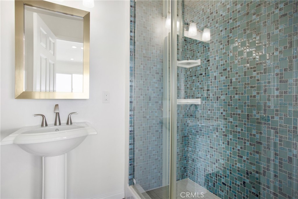 127 40th Street Manhattan Beach, CA 90266 - Photo 7 of 29 a bathroom with a shower and a sink