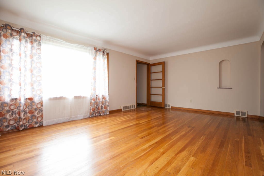 1603 Sheffield Road Cleveland, OH 44121 - Photo 12 of 34 The living room is spacious and has a very nice hardwood floor.