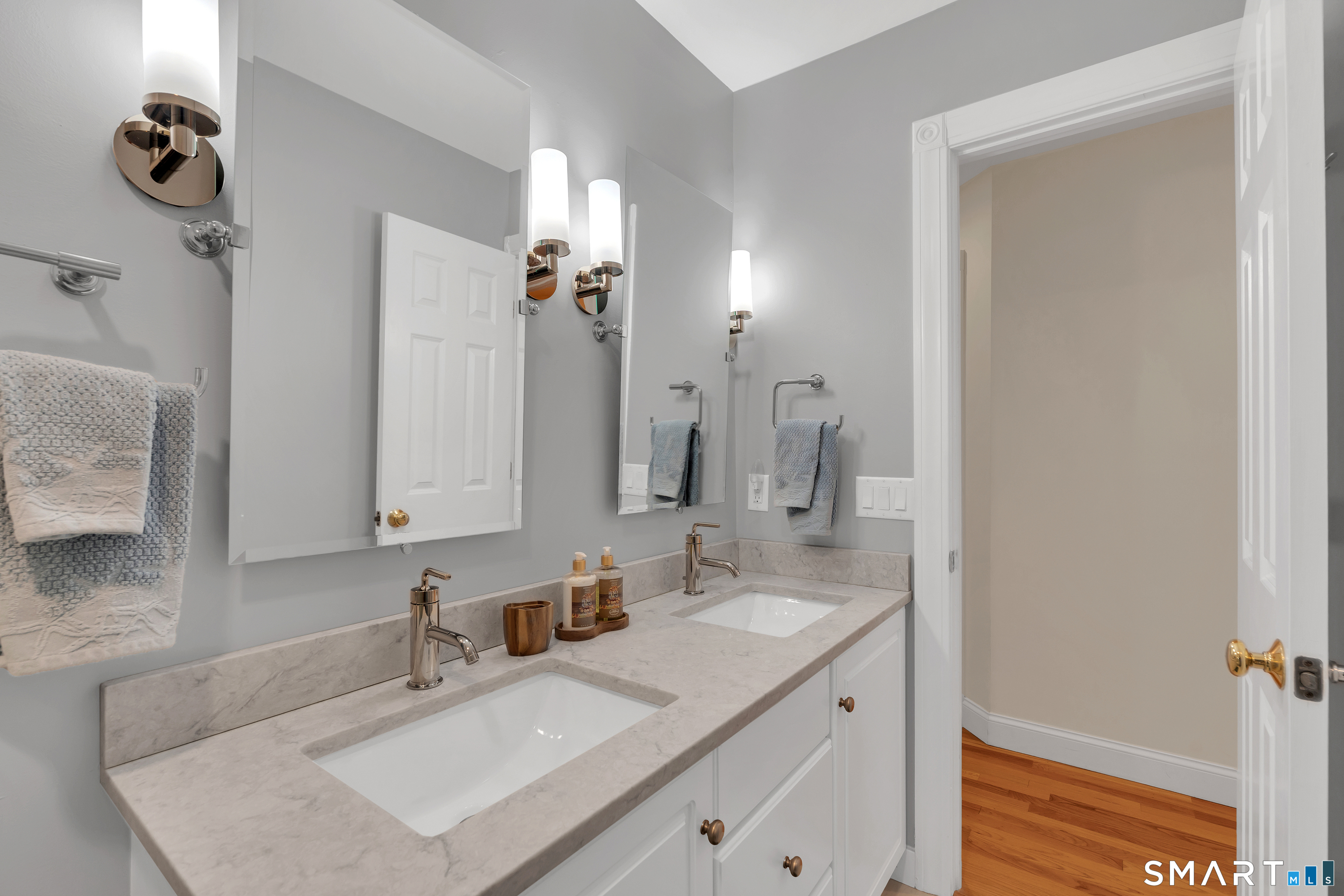 21 Stone Wall Road Salem, CT 06420 - Photo 23 of 38 a bathroom with a sink vanity granite and a mirror
