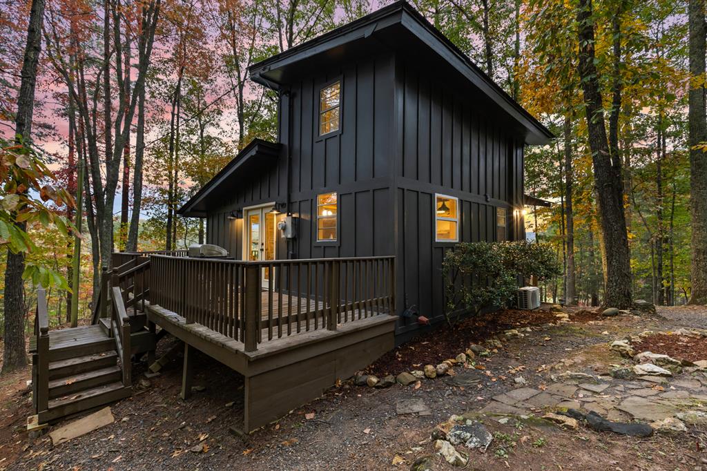 5240 Squirrel Hunting Road Blairsville, GA 30512 - Photo 1 of 40 a view of a house with a yard and wooden fence