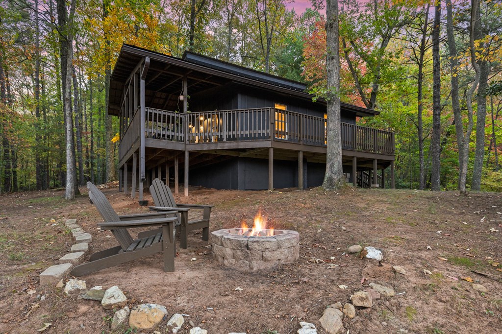 5240 Squirrel Hunting Road Blairsville, GA 30512 - Photo 28 of 40 a front view of a house with garden