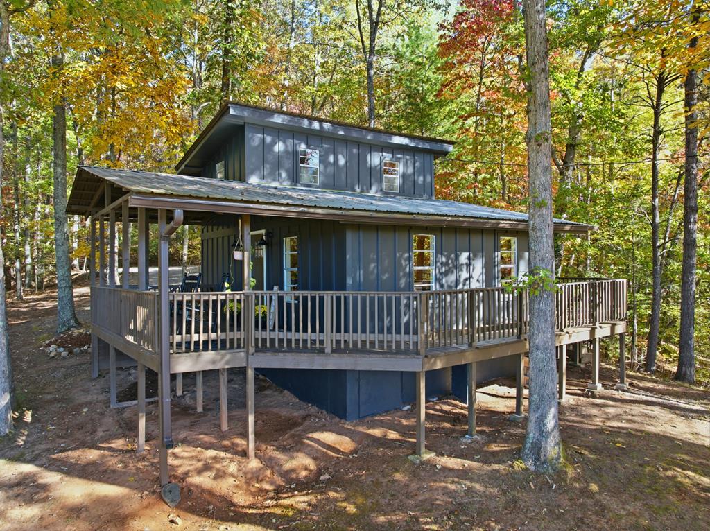 5240 Squirrel Hunting Road Blairsville, GA 30512 - Photo 32 of 40 a front view of a house with a porch