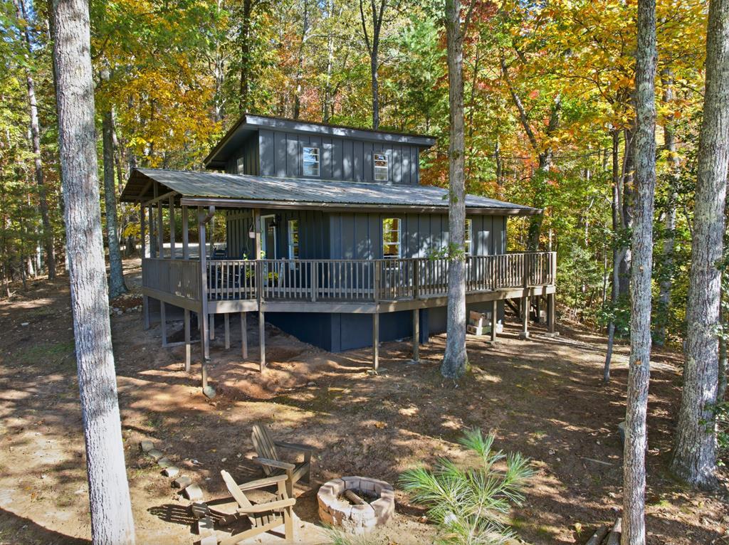 5240 Squirrel Hunting Road Blairsville, GA 30512 - Photo 33 of 40 a view of a house with a porch