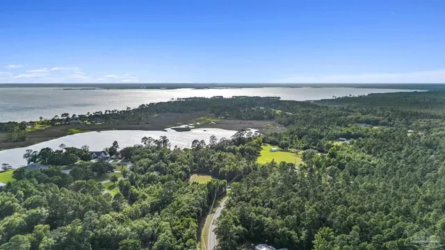 a view of a city with mountains in the background