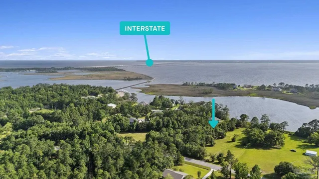 a view of a street with an ocean view