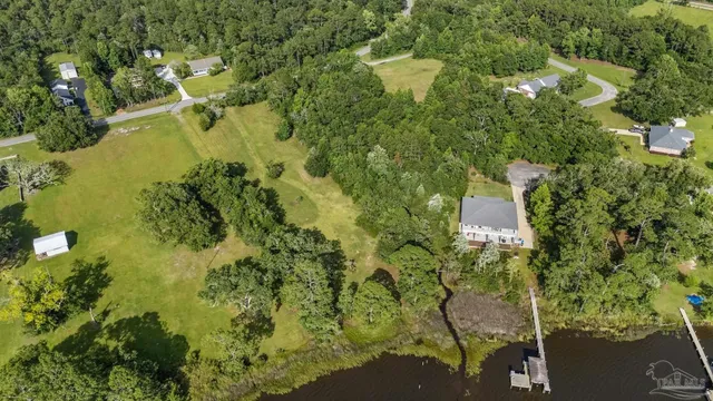 a view of a lake and green space