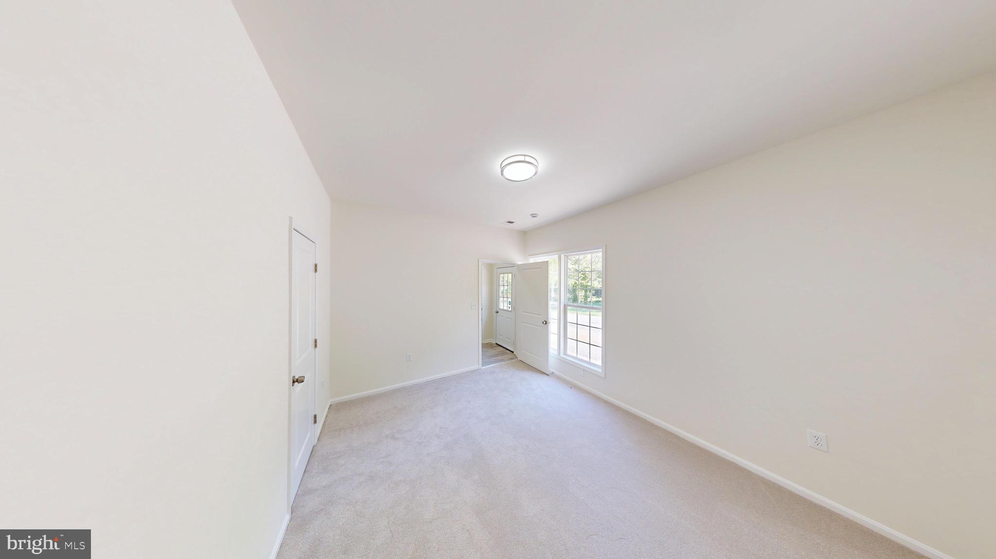 729 West Watersville Road Mount Airy, MD 21771 - Photo 11 of 42 a view of an empty room and window