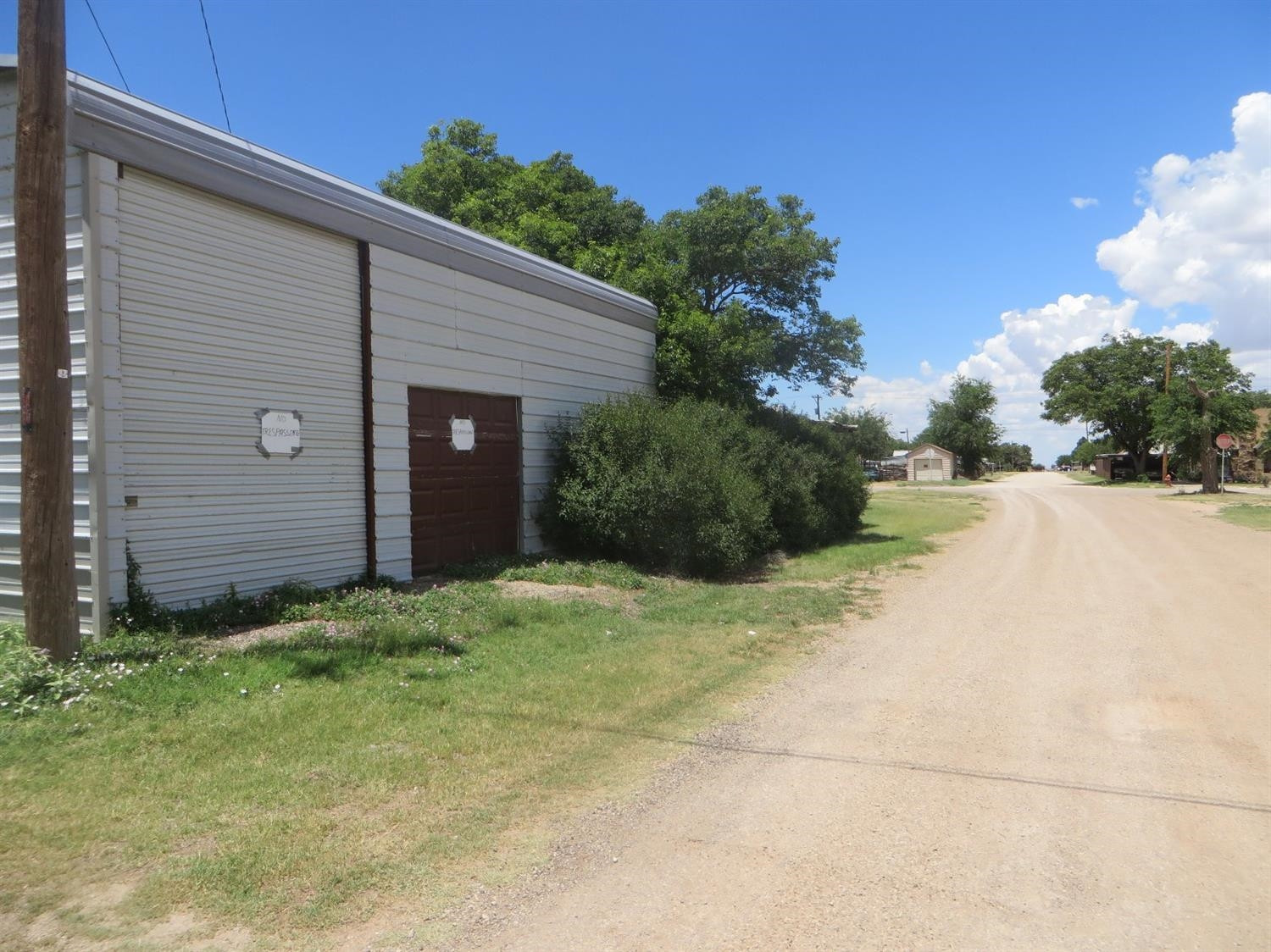 1420 Tilford Street Ralls, TX 79357 - Photo 3 of 7 a view of a backyard of the house