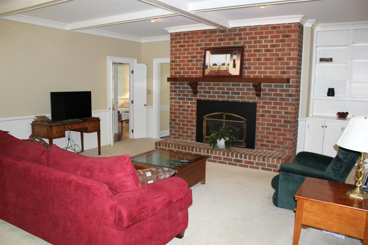 9401 Does Run Court Raleigh, NC 27613 - Photo 3 of 25 Family Room Fireplace with Bookshelves Adjoining