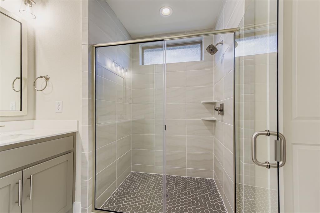 130 Pecan Lane Rhome, TX 76078 - Photo 16 of 28 Full bathroom featuring vanity and a shower stall