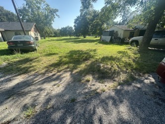 0 Inez Houston, TX 77023 - Photo 2 of 4 a backyard of a house with a yard and outdoor seating