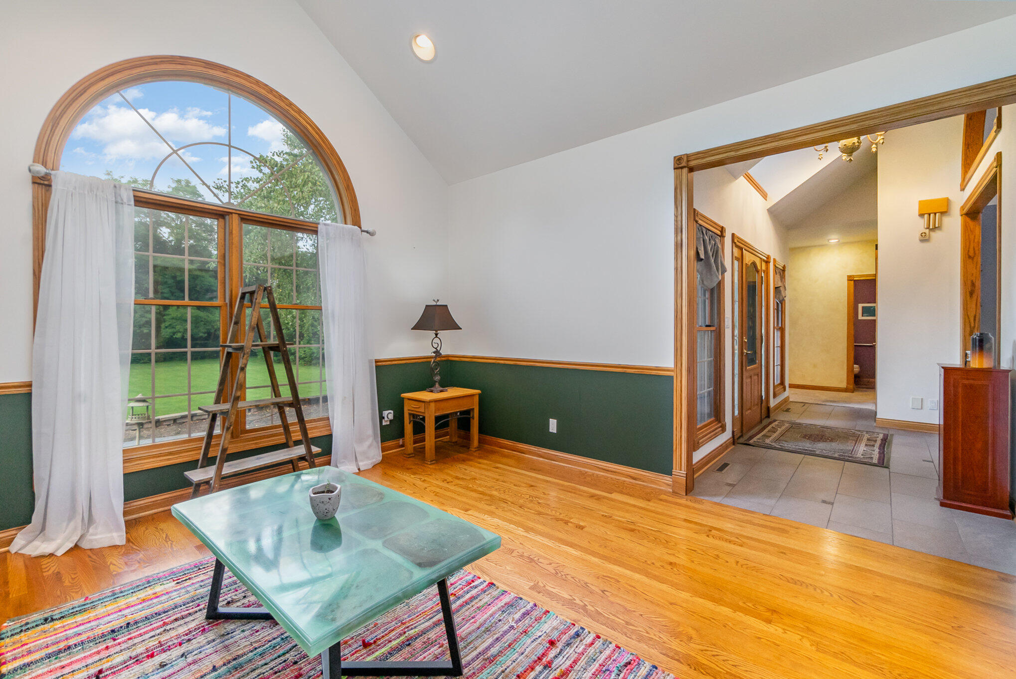 8855 East 93rd Avenue Crown Point, IN 46307 - Photo 11 of 41 a living room with furniture and a large window