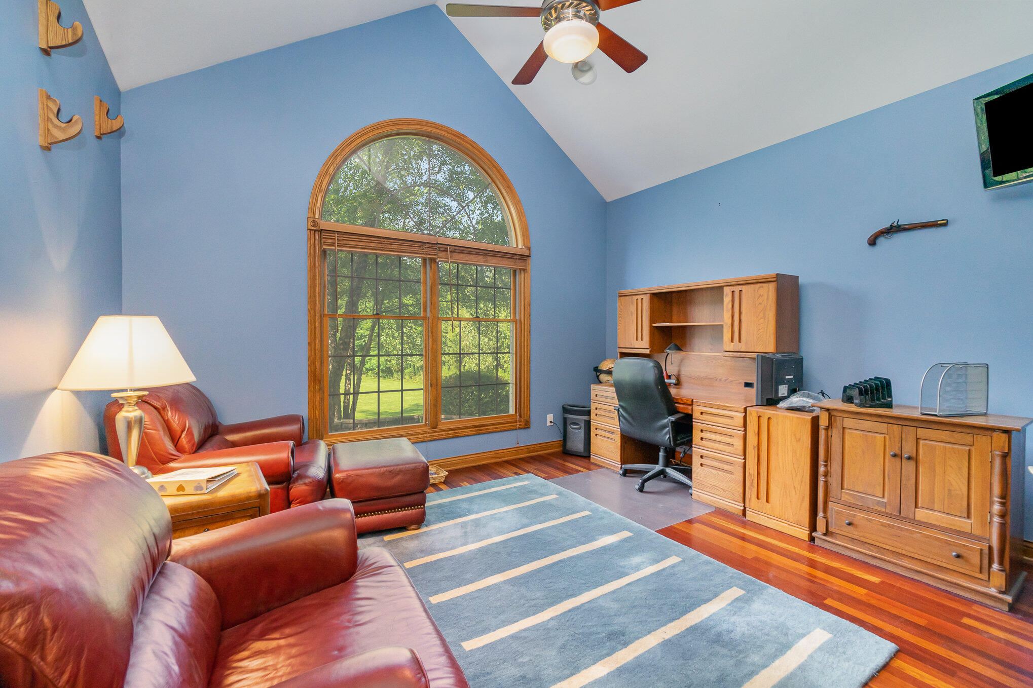 8855 East 93rd Avenue Crown Point, IN 46307 - Photo 12 of 41 a bedroom with furniture and a window