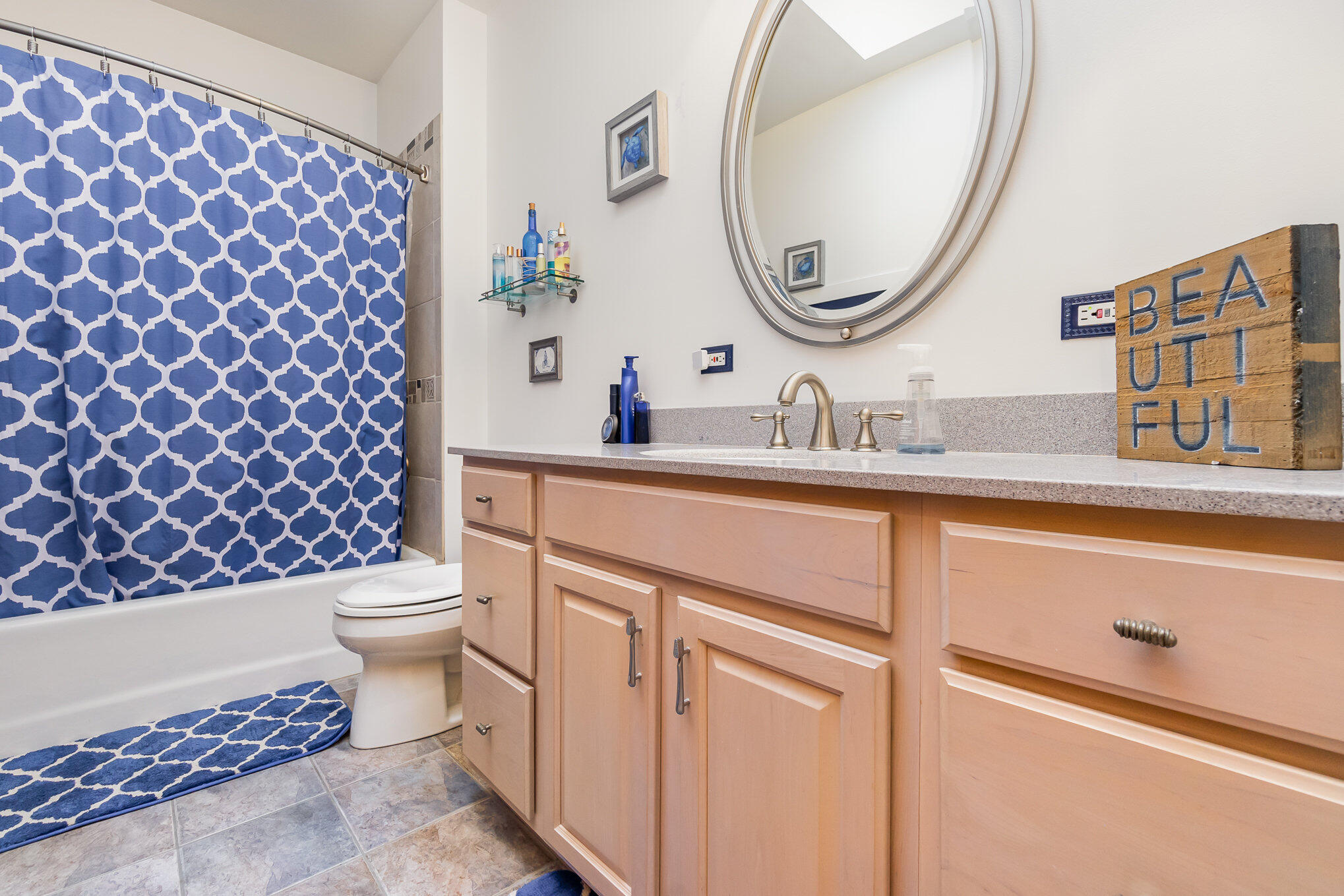 8855 East 93rd Avenue Crown Point, IN 46307 - Photo 15 of 41 a bathroom with a sink a toilet and a mirror