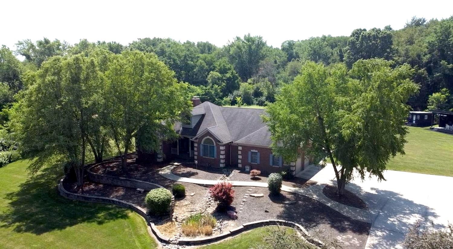8855 East 93rd Avenue Crown Point, IN 46307 - Photo 2 of 41 aerial view of a house with backyard and swimming pool