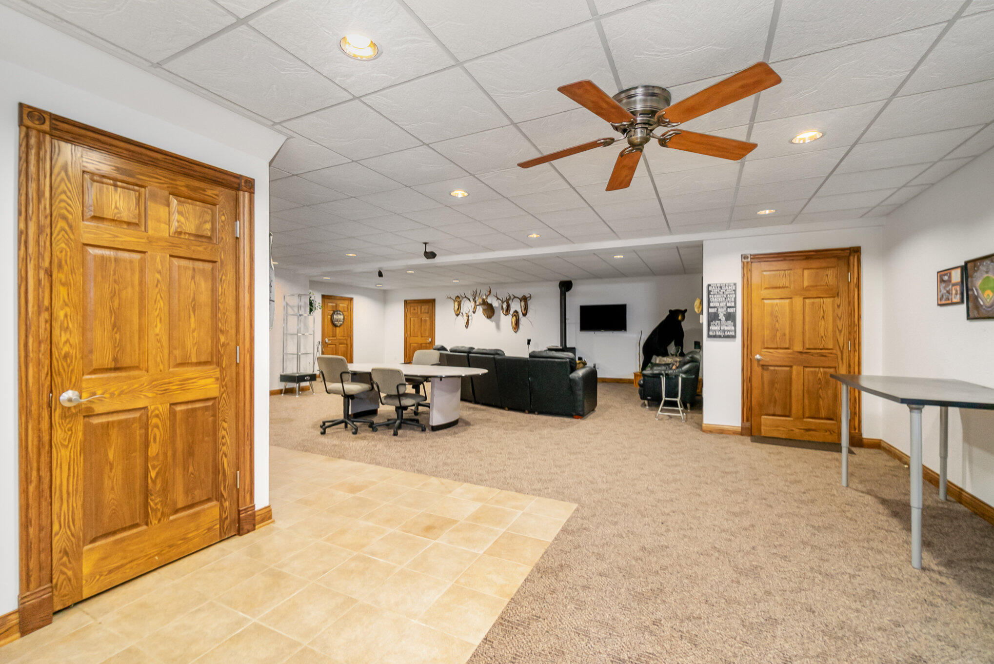 8855 East 93rd Avenue Crown Point, IN 46307 - Photo 24 of 41 a view of a livingroom with furniture and a ceiling fan