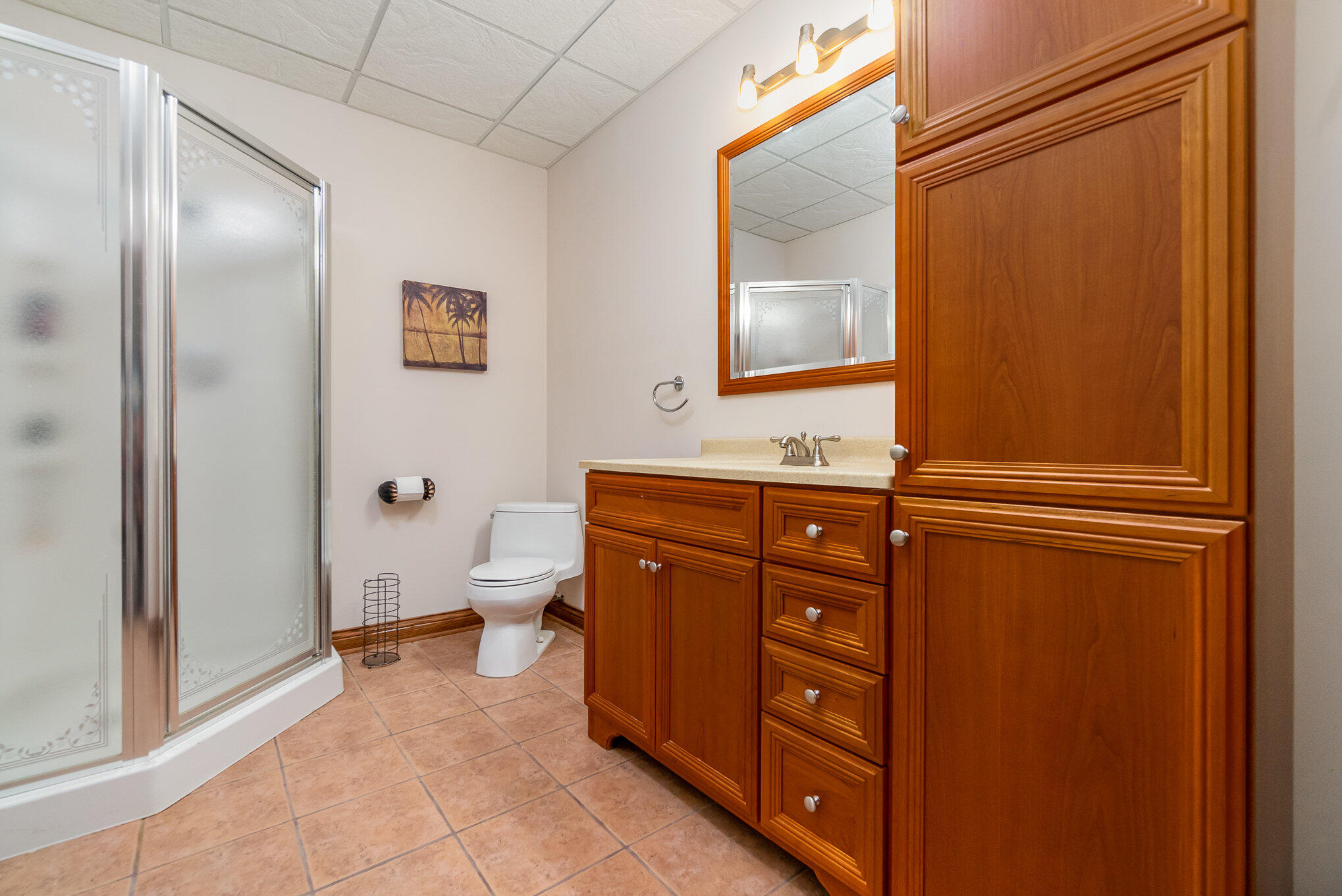 8855 East 93rd Avenue Crown Point, IN 46307 - Photo 27 of 41 a bathroom with a granite countertop sink toilet and mirror