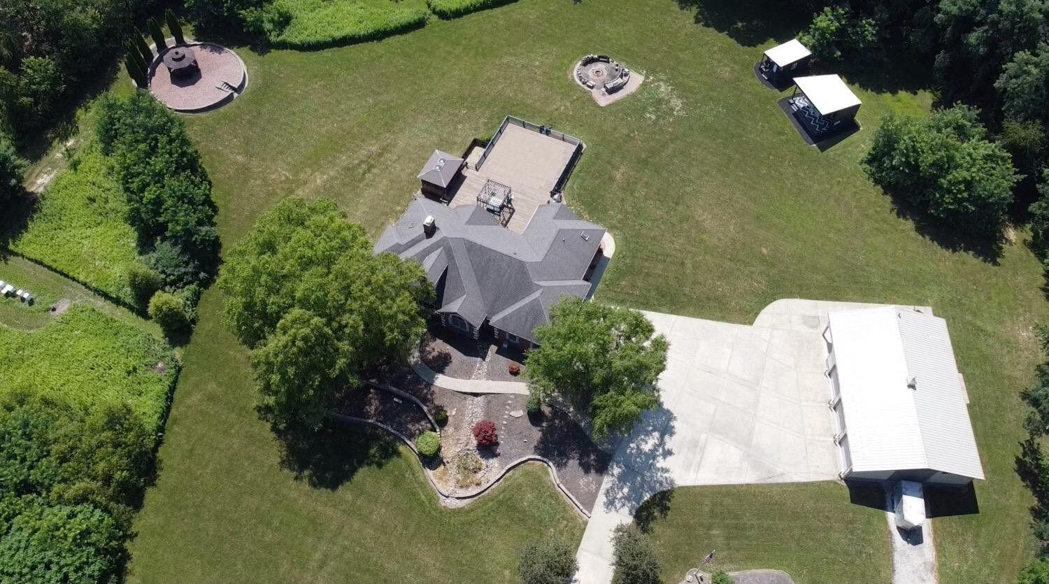 8855 East 93rd Avenue Crown Point, IN 46307 - Photo 3 of 41 an aerial view of a house with outdoor space