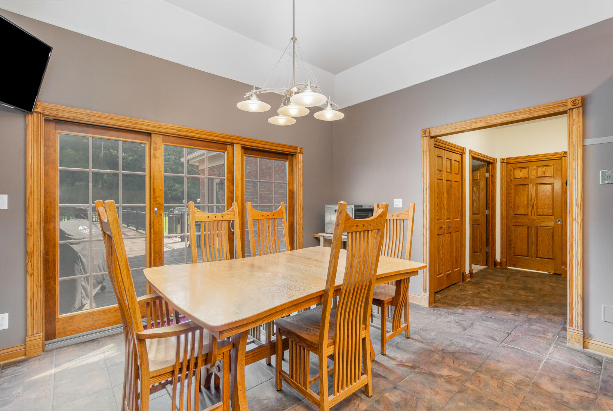 8855 East 93rd Avenue Crown Point, IN 46307 - Photo 9 of 41 a view of a dining room with furniture window and outside view