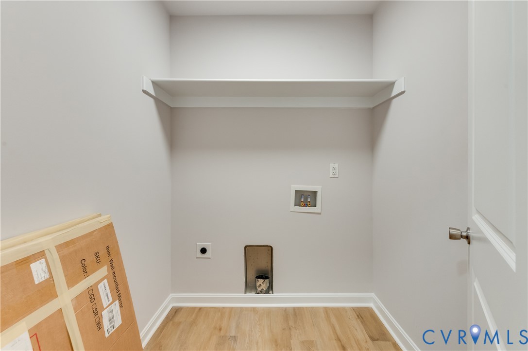 7906 Battlefield Park Road Henrico, VA 23231 - Photo 20 of 42 a bathroom with a sink and shower