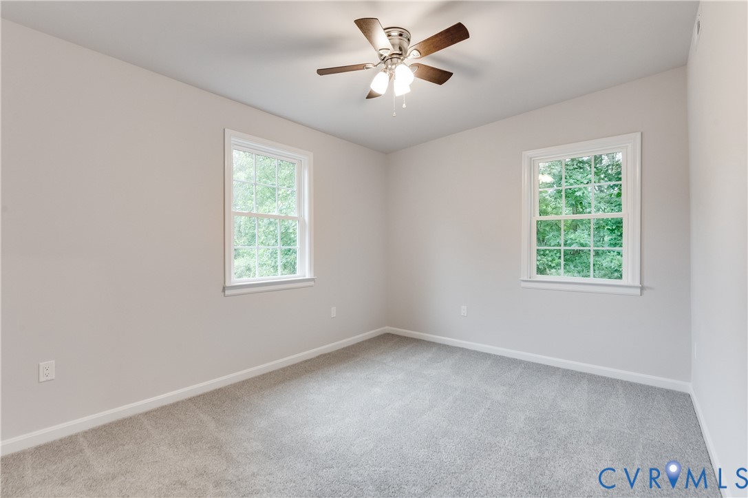 7906 Battlefield Park Road Henrico, VA 23231 - Photo 34 of 42 wooden floor in an empty room with a window