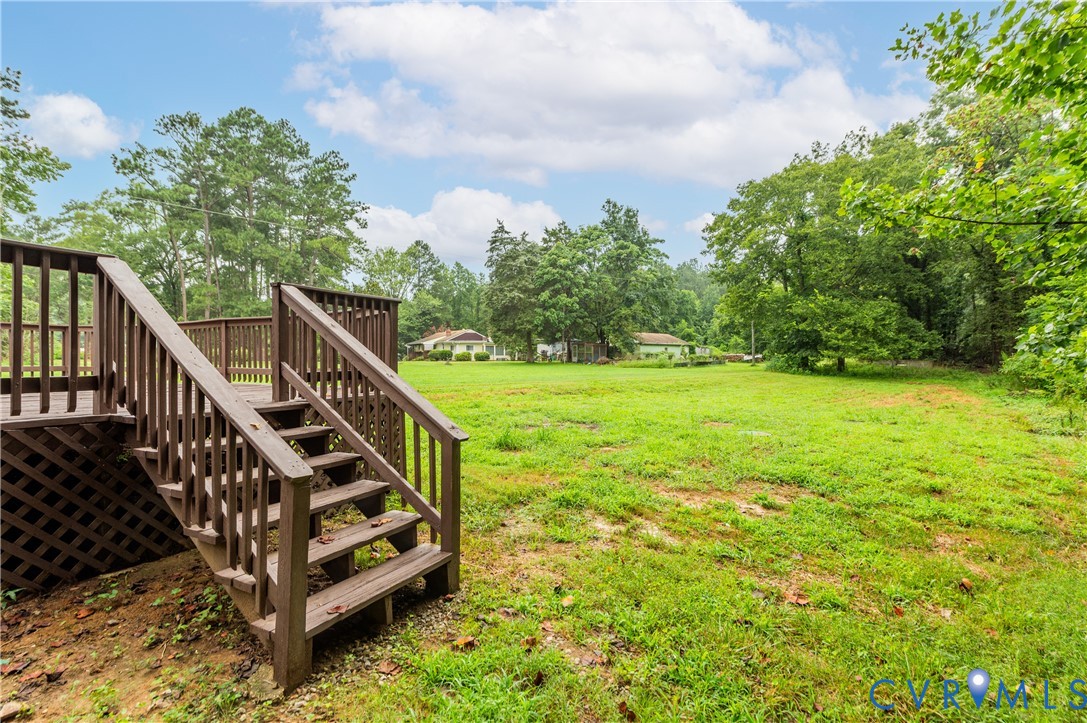 7906 Battlefield Park Road Henrico, VA 23231 - Photo 40 of 42 a view of a wooden deck with a yard