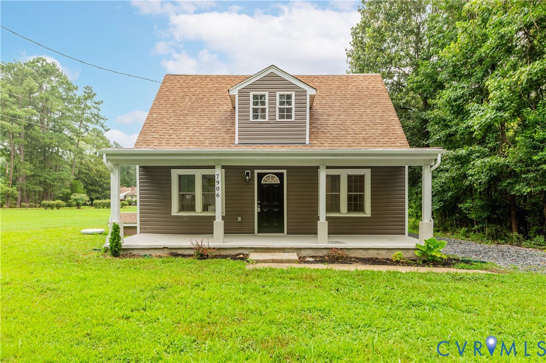 7906 Battlefield Park Road Henrico, VA 23231 - Photo 6 of 42 a front view of a house with a garden