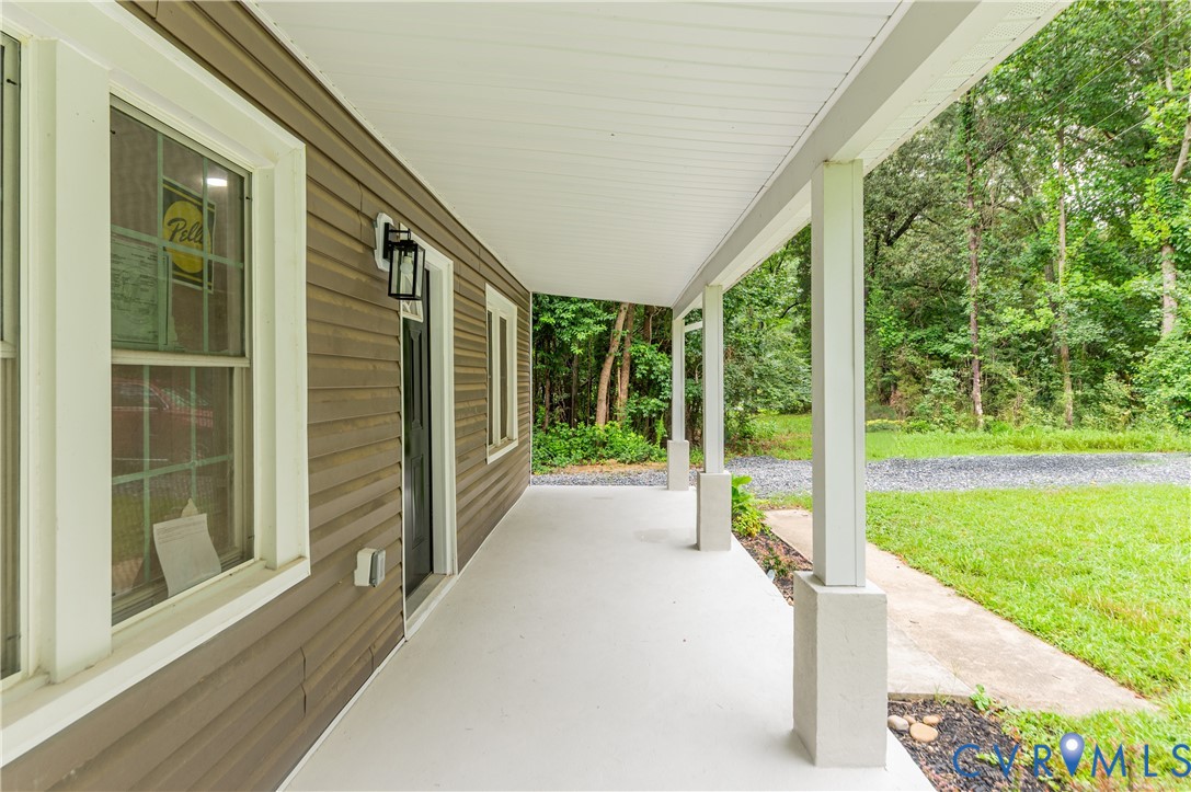7906 Battlefield Park Road Henrico, VA 23231 - Photo 7 of 42 a view of porch with a swimming pool