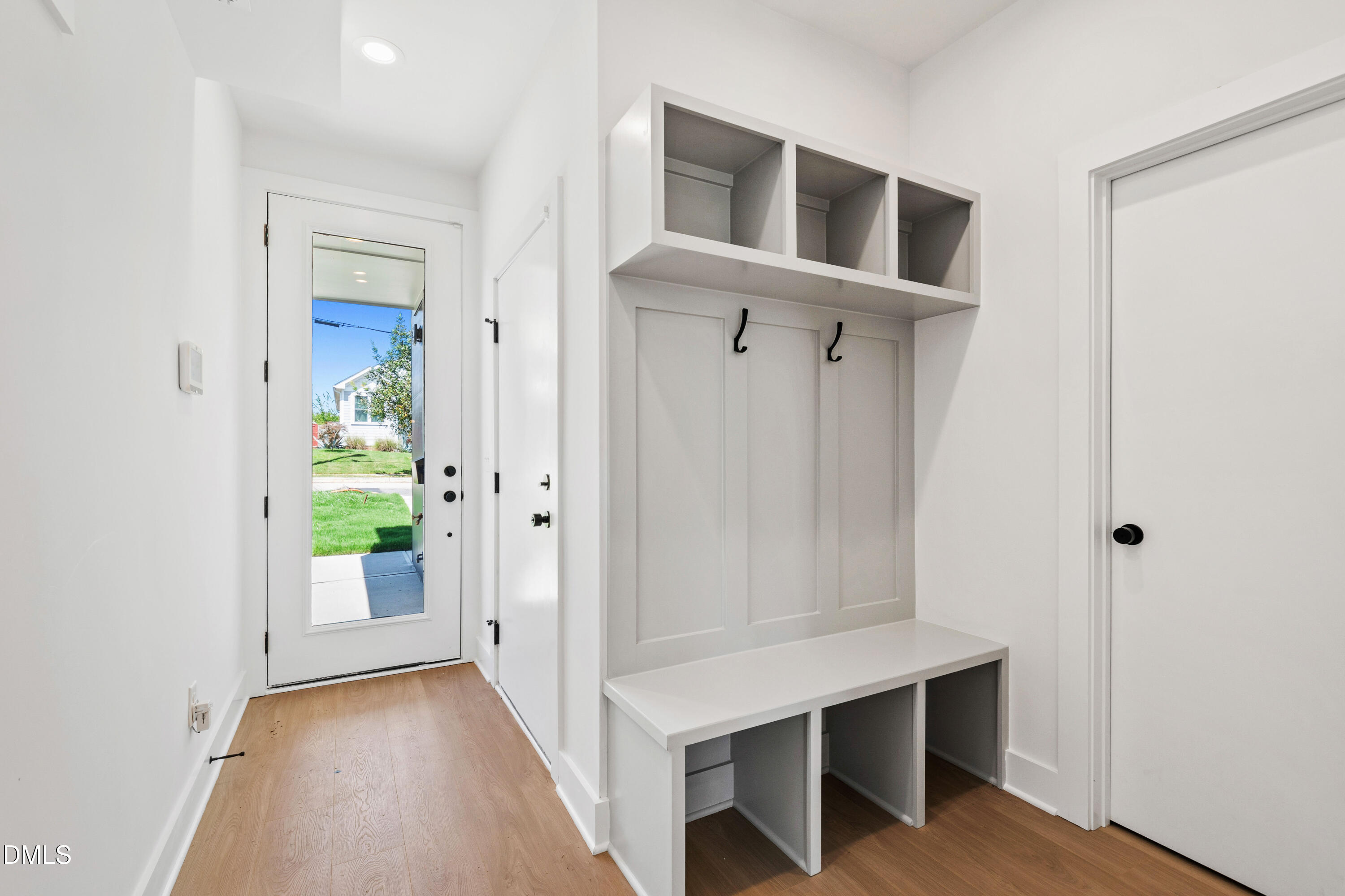 1508 Boyer Street Raleigh, NC 27610 - Photo 11 of 52 a view of an entryway with wooden floor
