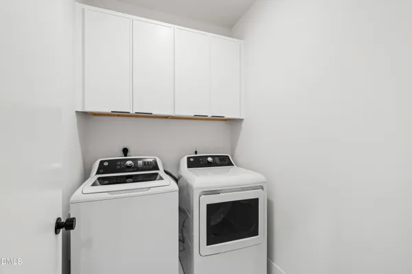 an empty room with wooden floor