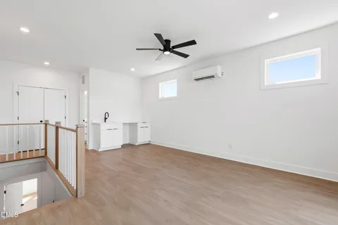 a utility room with sink dryer and washer